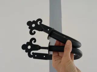 Coppia fermatenda neri in metallo