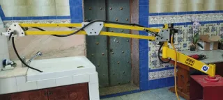 Brazo articulado CMA con cabezal punzonador