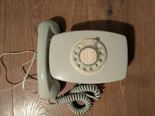 Teléfono antiguo CTNE beige/gris