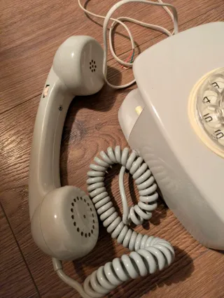 Teléfono antiguo CTNE beige/gris