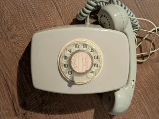 Teléfono antiguo CTNE beige/gris