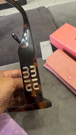 Óculos de Sol Miu Miu Castanhos