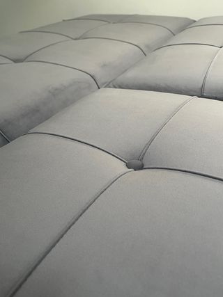 Divano letto in velluto grigio a 3 posti