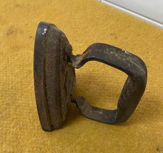 Plancha antigua de hierro