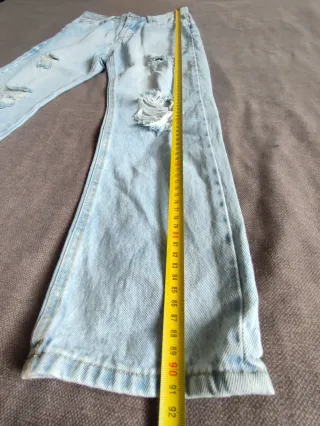 Vaqueros rectos desgastados