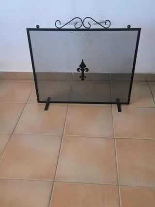 Estufa de leña con horno, tubos y accesorios.