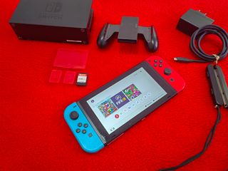 Vendo o cambio Nintendo Switch + Juego Accesorios