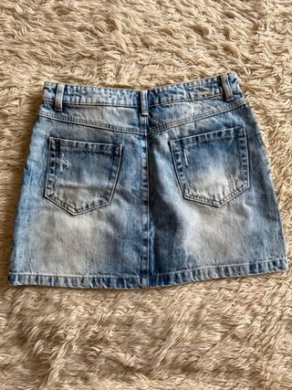 Falda vaquera mini desgastada