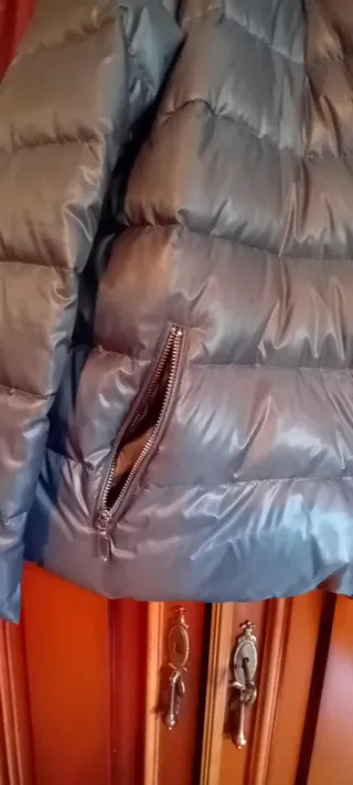 Plumas Purificación García gris