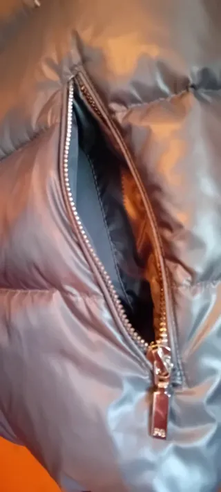 Plumas Purificación García gris