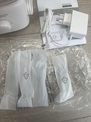 Irrigador Dental Sawgmore Eléctrico + 4 Boquillas