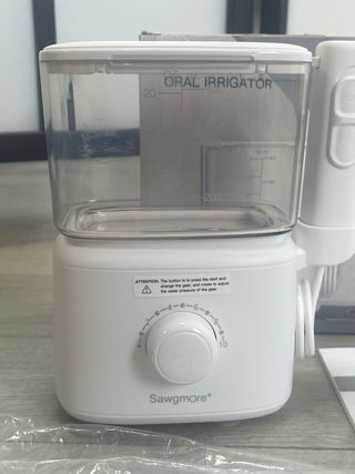 Irrigador Dental Sawgmore Eléctrico + 4 Boquillas