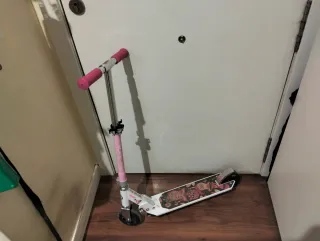 Patinete Oxelo rosa y blanco