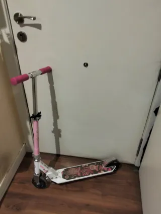 Patinete Oxelo rosa y blanco