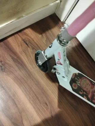 Patinete Oxelo rosa y blanco