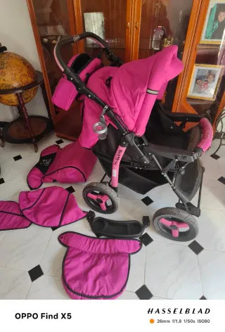 Carrito de bebé niña rosa