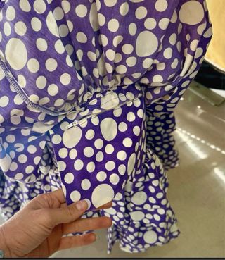 Traje de flamenca morado con lunares blancos