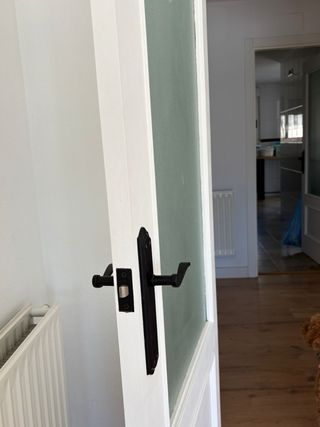 Puerta interior de madera con cristal blanca