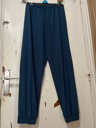 Pantalones deportivos azul petróleo