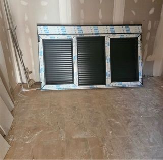 Ventana de dos hojas con fijo central