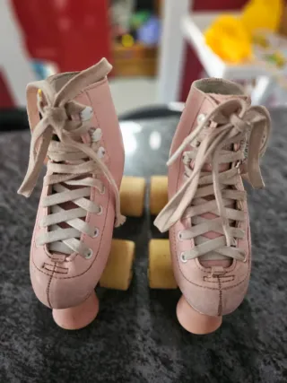 Patines artísticos rosas