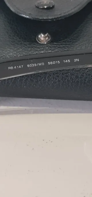 Gafas de sol Ray-Ban negras y moradas