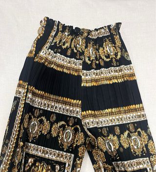 Pantalón Palazzo Negro con Estampado Dorado