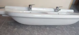 Lavabo doble Roca con grifos Roca