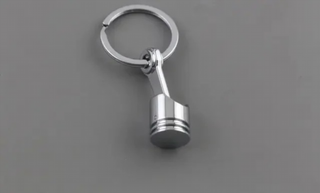 NUEVO LLAVERO PISTÓN CROMADO REGALO REF.1284