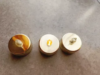 Lumini a pila dorati