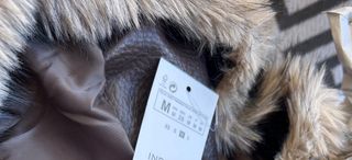 Cazadora efecto piel con cuello pelo M