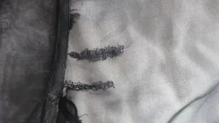 Blusa cruzada semitransparente negra