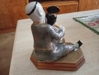Figura porcelana china pareja sentada