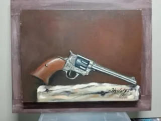 Pintura al óleo de revólver antiguo