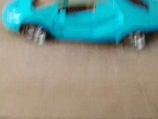 Coche de metal azul juguete