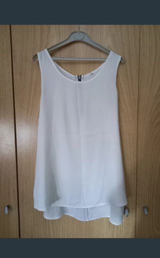 Blusa blanca sin mangas