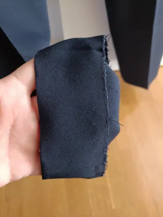 Traje comunión azul marino con detalles dorados