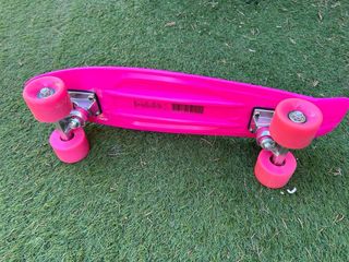 Monopatín rosa