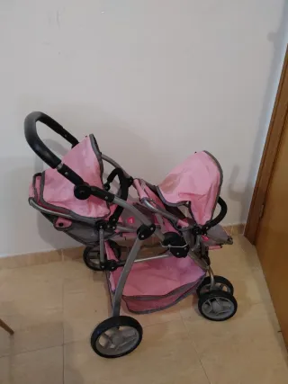 Carrito doble de muñecas rosa