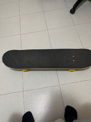 Monopatín con diseño graffiti Negociable