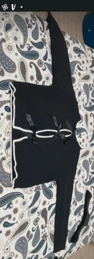 Maglione nero con fiocchi XXL