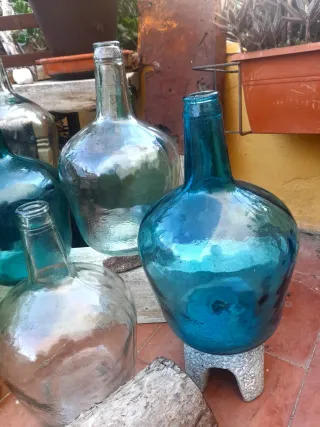 Damajuanas antiguas de vidrio