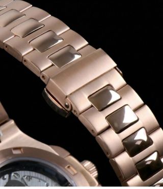 SEIKO CUSTOM NAUTILUS GOLD OPEN HEART