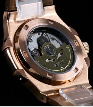 SEIKO CUSTOM NAUTILUS GOLD OPEN HEART