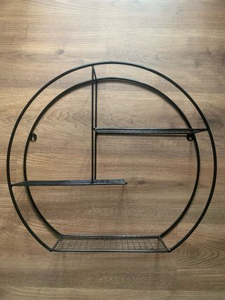 Estantería redonda metálica negra