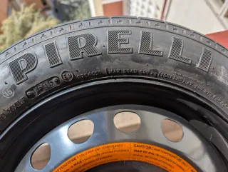 Rueda de repuesto tipo galleta (sin usar)