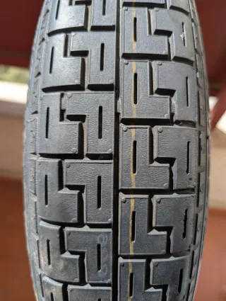 Rueda de repuesto tipo galleta (sin usar)