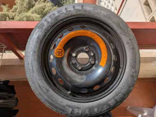 Rueda de repuesto tipo galleta (sin usar)