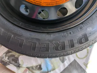 Rueda de repuesto tipo galleta (sin usar)