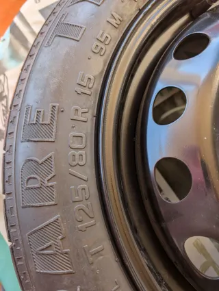 Rueda de repuesto tipo galleta (sin usar)